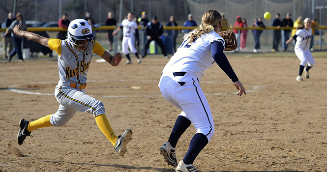 Sophomore outfielder Dani Ramos makes a safe leap to first base for Kent State during a double header against University of Akron on Saturday, March 30. Kent State defeated Akron in both games, the first with a final score of 2-1 and the second with a final score of 5-3. Photo by Jenna Watson.