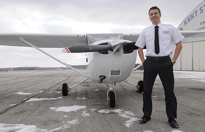 Ryan Weber, a senior aeronautics major, poses in front of one of the types of new planes that the College of Applied Engineering has bought. Weber is a registered flight instructor, in addition to his degree. Photo by Jacob Byk.