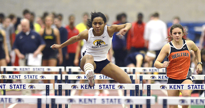 Junior JoAnne Pittman runs the 60 meter hurdle event during the Kent State Tune Up track and field meet on Saturday, Feb. 16, 2013. MATT HAFLEY