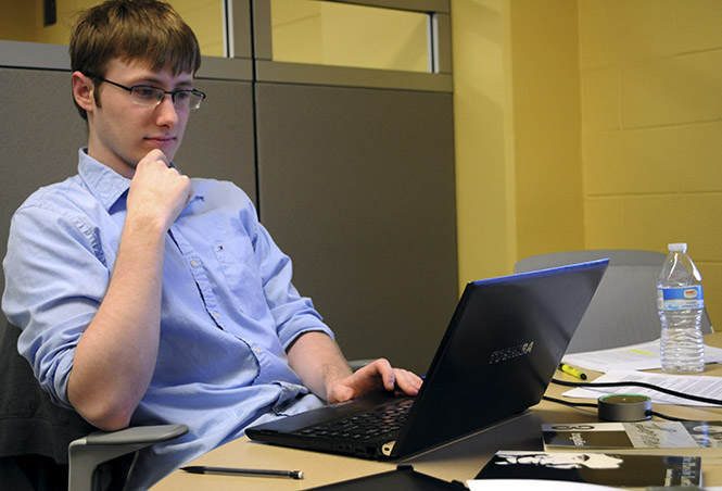 Junior Integrated Language Arts major Alex Simon studies for a Spanish exam on the fourth floor of the Kent State Library on April 7. Photo by Rachael Le Goubin.