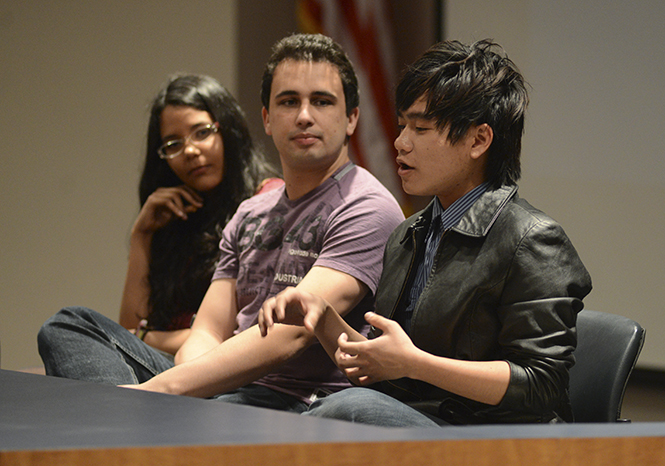 Pride! Kent member Phuong Nhat Minh talks to fellow members in the Governance Chambers about his experiences with LGBT community inclusion in his native country of Vietnam at the weekly meeting on Thursday. Three student members spoke about LGBT views and experiences in their native countries. Photo by Jenna Watson.
