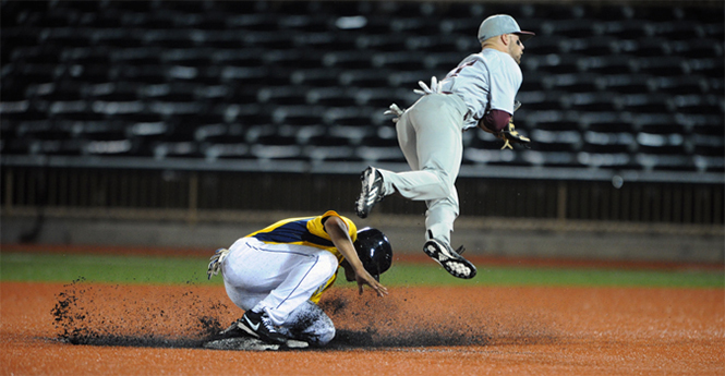 Junior infielder Derek Toadvine slides to second base against Central Michigan during the first round of the Mid American Conference Championship tournament at the All Pro Freight Stadium in Avon, OH on May 23; 2013. The Flashes beat Central Michigan, 15 - 8, and will face Ball State on Thursday, May 24 at 4 p.m. Photo by Matt Hafley.