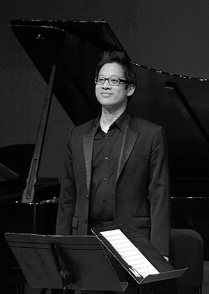 Jerry Wong, associate professor of music, performs in the Carl F.W. Ludwig Recital Hall on June 27, 2012. Wong, along with fellow associate professor, Donna Lee, created the Piano Institute in 2005. Photo by Jenna Watson