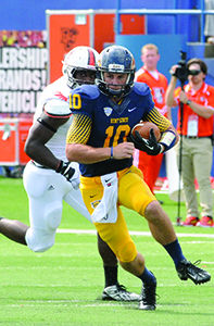 Red shirt freshman quarterback Colin Reardon runs the ball against Bowling Green Saturday, Sept. 7, 2013. The Flashes lost 22-41. Kent State plays at Western Michigan University Saturday. Photo by Rachael Le Goubin.