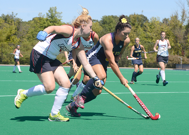 Kent State senior Rebecca Lee rushes towards the goal during a exhibition game against Robert Morrison on Friday Aug. 23. Kent State went to East Lansing, Mich. over the weekend and won a match against Monmouth University but lost against Syracuse University. . Photo by Melanie Nesteruk.