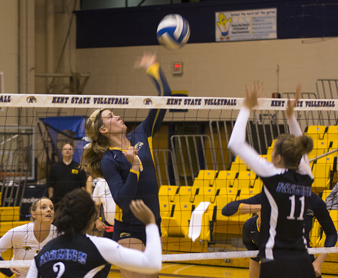 Kelly Hutchison spikes the ball during a game against Eastern Illinois Saturday Sept. 21; 2013. Kent State won the game 3-1. Photo by Abby Schafer .