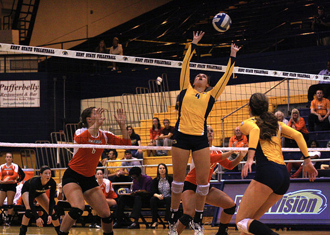 Kent State Senior Aleksandra Nowak sets the ball to her teammates duringthe game against Bowling Green State University on Friday Oct. 4; 2013. Kent State lost the match; 1-3. Photo by Emily Lambillotte.