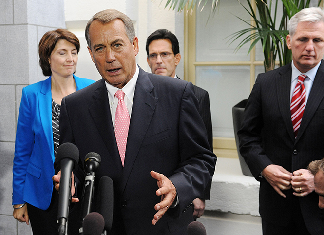 Speaker of the House John Boehner (R-OH), flanked by Reps. Cathy McMorris Rodgers (R-WA) and Eric Cantor (R-VA) speaks at a press conference after a Republican Conference meeting at the U.S. Capitol Sept. 30, 2013, in Washington, DC. Photo courtesy of MCT Campus.