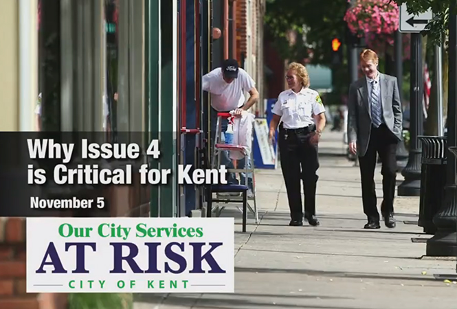 Kent+Police+Chief+Michelle+Lee+and+City+Manager+Dave+Ruller+in+a+promotional+video+for+Issue+4.+Video+still+courtesy+of+the+Kent+Police+Department.