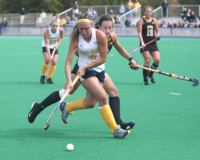 Golden+Flash+Hannah+Faulkner+blocks+the+puck+from+an+Iowa+opponent+on+Sunday+Sept.+22%2C+2013.+Kent+State+will+go+against+the+University+of+Miami+this+Sunday+at+home.+Photo+by+Brianna+Neal.