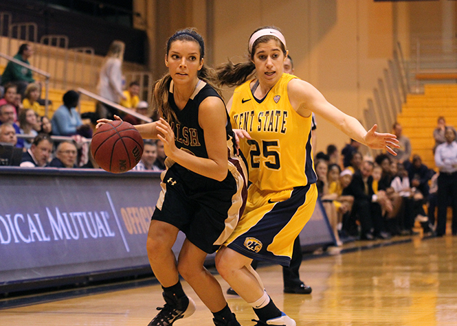 Guard Rachel Mendelsohn tries to steal the ball in the game against Walsh University in the M.A.C. Center on Wednesday, Nov. 6, 2013. Kent State womens basketball team loses the game to Walsh University 89-80. Photo by Yolanda Li.