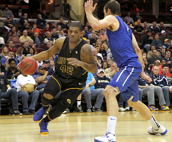 Junior forward Darren Goodson (left) drives down the court against Buffalo last season in the MAC Tournament Quarterfinals on March 14, 2013, at Quicken Loans Arena in Cleveland. Photo by Shane Flanigan.
