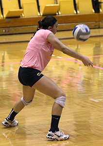 Junior defensive specialist Kaylee Koller bumps the ball to the setter during a game against Toledo on Saturday, Oct. 19, 2013. Photo by Erin McLaughlin.