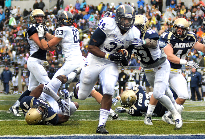 Junior running back Trayion Durham scores Kent States only touchdown in the Wagon Wheel game against Akron on Saturday, Nov. 2, 2013. The Flashes lost to the Zips 16-7. Photo by Rachael Le Goubin.