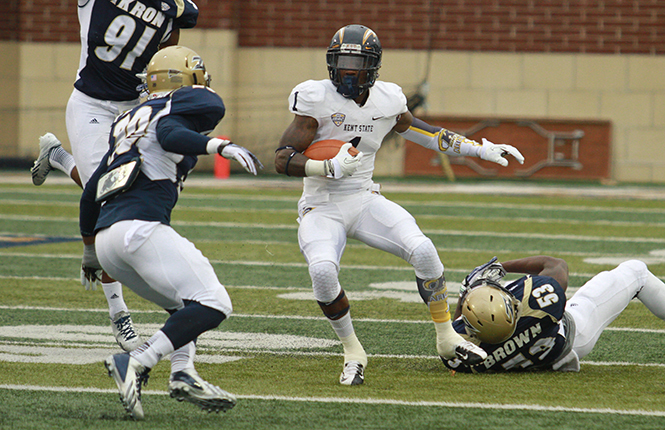Senior running back Dri Archer dots through the Akron defense on Saturday Oct. 26, 2013. Kent State will face Miami of Ohio tonight at Dix Stadium at 8:00 p.m. Photo by Brian Smith.