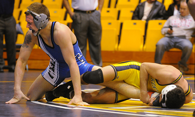 Kent State's wrestling teams competes against Buffalo in the MACC on Feb. 3, 2012. Photo by Philip Botta.