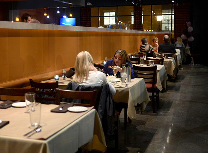 A+dining+room+of+guests+enjoy+Italian-style+meals%2C+Wednesday%2C+Jan.+22%2C+2014%2C+at+Bricco+downtown+just+13+days+after+the+restaurants+initial+opening.
