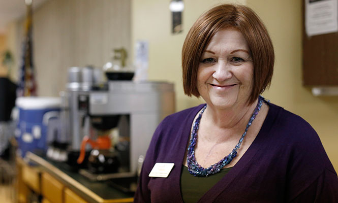 Anne Marie Mann-Noble, the Director of Emergency and Outreach Services for Family & Community Services, stands by the kitchen for the community center in Ravenna on Wednesday, Jan. 29, 2013. The center is open 24 hours a day when the temperature reaches 10 degrees to accommodate the homeless.