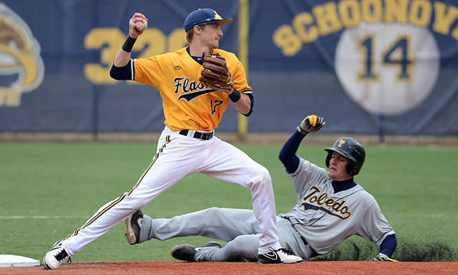 Kent+State+sophomore+infielder+Justin+Wagler+tags+out+a+Toledo+opponent+at+Saturdays+game%2C+March+22%2C+2014%2C+ending+in+a+6-2+victory+for+the+Flashes.