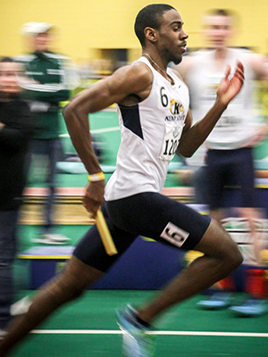 Kent State Senior Laron Brown III competes in the mens 4x400 Relay during the 2014 Indoor Track and Field MAC Championship, Sat., March 1, 2014. The mens team placed second in the MAC Championship.