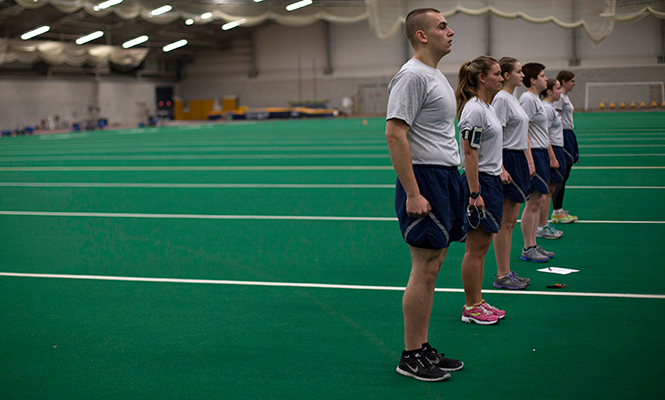 Air Force ROTC cadets line up in the field house after they finish the Physical Fitness Test Friday Feb. 7, 2014.