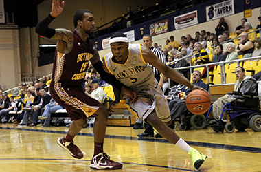 Senior forward Chris Evans (right) drives to the basket during a 69-68 victory over Bethune-Cookman, Nov. 20, 2012, at the M.A.C. Center.