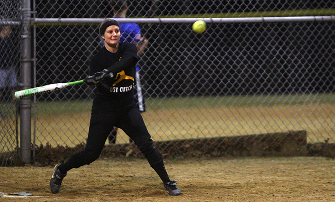 Sophomore+of+Sports+Adminstration+Erica+Thorwart+comes+up+to+bat+during+an+intramural+softball+league+game%2C+Wednesday%2C+April+9%2C+2014.