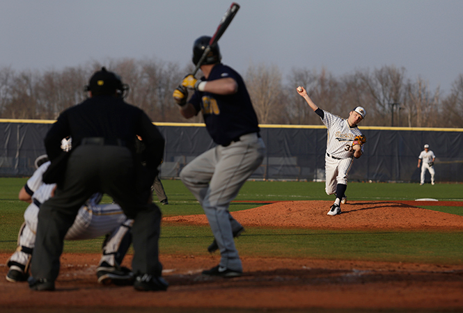 Nick Jensen-Clagg pitches against the Toledo Rockets at Schoonover Stadium on Friday, March 21, 2014. The Flashes face Miami University this weekend, April 11-13 at Schoonover Stadium.