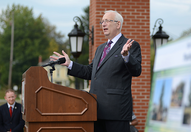 President Lester Lefton addresses the crowd, Oct. 3, 2013, minutes before univeristy trustee Jane Murphy Timken would announce that the Esplanade walkway will be named after Lefton. The dedication will commemorate the outgoing president not just for his efforts on the Esplanade, which was expanded to better connect campus with downtown, but for all of his improvements made downtown over the past several years.
