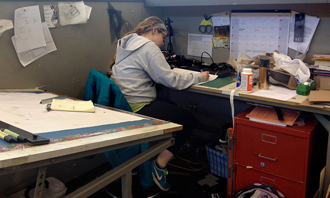 Sophomore architecture major Mary Stiger works on class work in the architecture studio Wednesday, April 9, 2014.