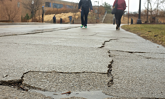 The+extreme+temperatures+and+the+abnormally+harsh+winter+at+Kent+have+created+cracks+and+damage+to+campus+roads+and+sidewalks.