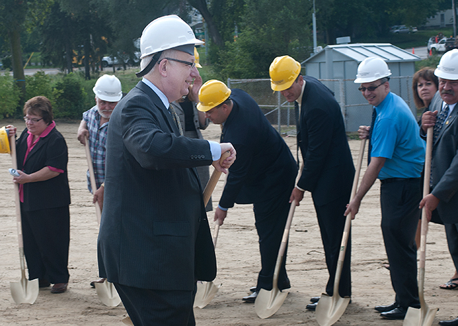 President Lester Lefton prepares to break ground, Aug. 8, 2011, the beginning of years of extensive downtown development.