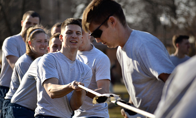 Airforce ROTC cadets work in teams for tug of war as part of group training exercises and games outside of Taylor Hall on Tuesday, April 1, 2014.