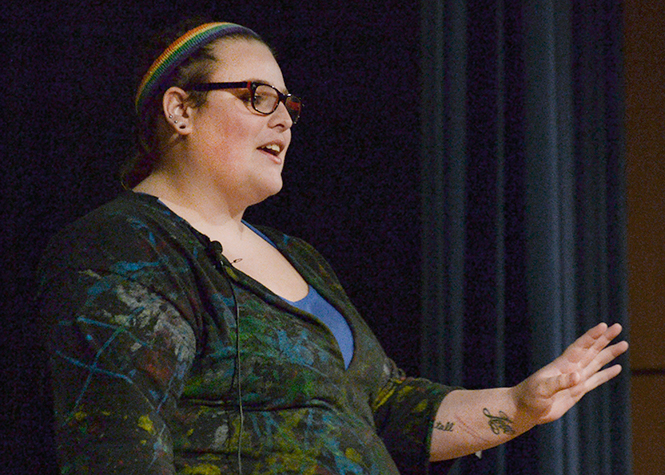 Sophomore psychology major Taylor Ault speaks at the U-Night To End Stigma event about her history with self harm and attempted suicide in the Student Center Ballroom, Monday, April 14, 2014. Ault said, me being able to stand up here and talk about my addiction proves it is fightable.