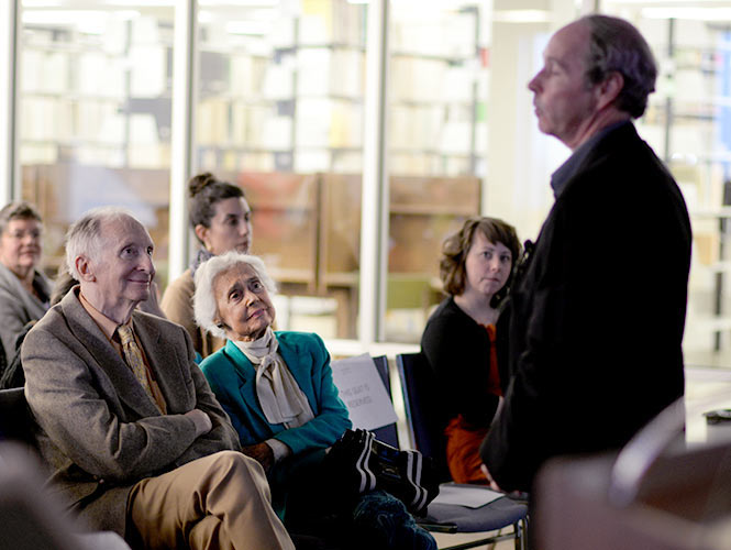 Albert Borowitz and his wife Joan Mortimer listen to Dr. Thomas Doherty as he presents a lecture about the media coverage on the 1932 Lindbergh baby kidnapping case Thursday, April 17, 2014. Albert Borowitz created the true crime exhibit on display on the 12th floor of the library in honor of the 25th Anniversary Borowitz Lecture.