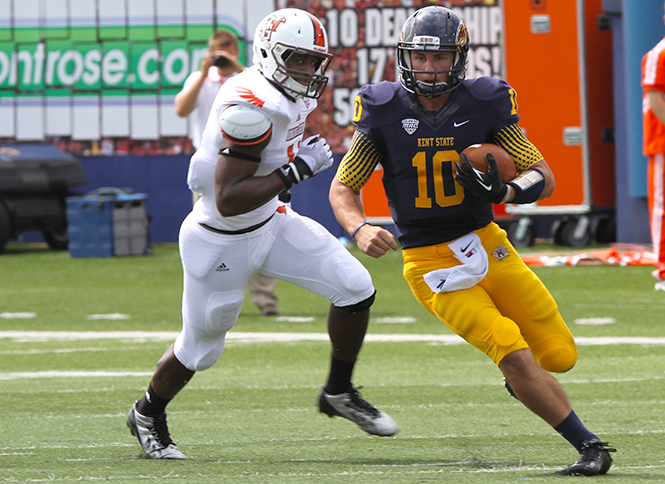 Kent+State+quarterback+Colin+Reardon+outruns+an+opponent+from+Bowling+Green+Saturday%2C+September+7%2C+2013.
