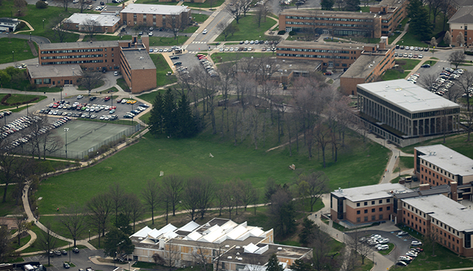 An aerial shot of the May 4 Memorial, with Taylor Hall on the right, and Blanket Hill center, taken April 28, 2014.