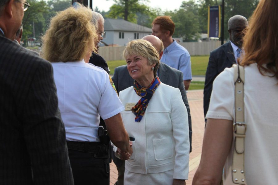 Kent State Universitys new President Beverly Warren shakes hands with Chief Michelle A. Lee on the Esplanade on July 1, 2014.