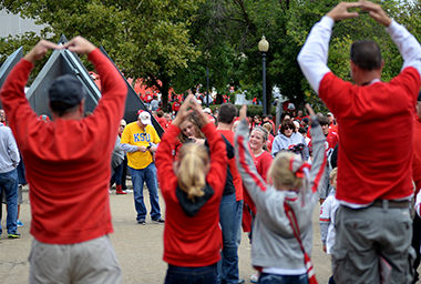 Kent State fans stand out in a sea of red prior to the Kent State vs Ohio State game Saturday, Sept. 13, 2014.