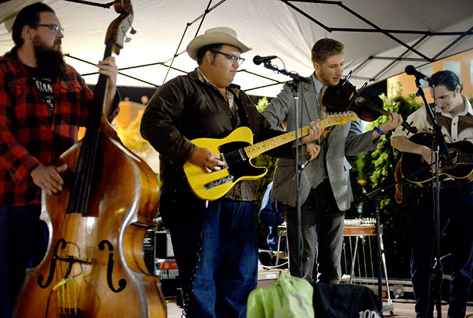 Johnny and the Apple Stompers perform in Acorn Alley Friday, Sept. 19, 2014 as part of Kents Rountown Music Festival.