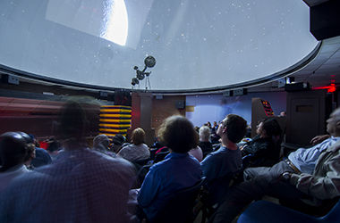 Brett Ellman leads a special program in the planetarium Friday, Sept. 26, 2014 describing the history of different constellations as well as the physical make-up of stars and galaxies.