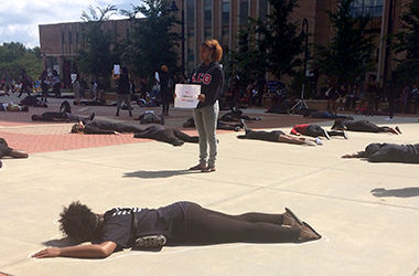 Black United Students stages a “Die-In” on Risman Plaza in silent protest of the Ferguson shooting and riots.