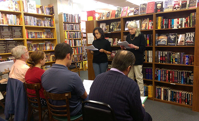 Carol Maier reads Nuria Amats unfaithful translations of Emily Dickinson at the Last Exit Bookstore during the literary text reading Tuesday, Sept. 30, 2014 held by Kent States translations studies program.
