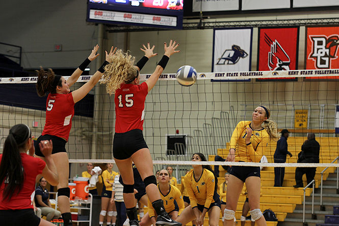 Lauren Engleman, Outside Hitter, spikes the ball against Youngstown State University to gain a point for Kent State Univerisity on Tuesday, Sept. 16, 2014. The Flashes win (3-2)