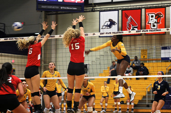 Tinuke Aderemi-Ibitola, Outside Hitter, spining the ball against Youngstown State University to get the point for Kent State University on Sept. 16, 2014. The Flashes won, 3-2.