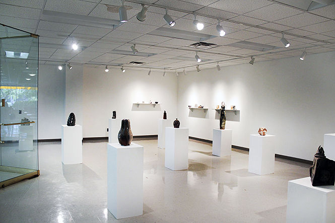 Ceramic art pieces created by Kent State students are on display in the lower level art gallery at Kent State Stark.