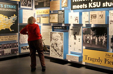 Kent State alumni Susan Avery of Denver, CO, tours the May 4 Visitors Center Wednesday, Sept. 17, 2014. Avery graduated in 82 and said that she wanted to visit the center to pay her respects.