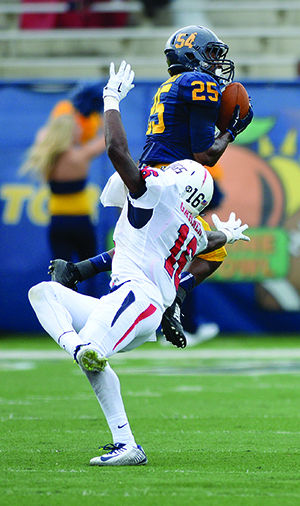 Sophomore wide receiver Earnest Calhoun completes a pass from sophomore quarterback Colin Reardon at the game against Southern Alabama Saturday, Sept. 6, 2014. The Flashes lost their game against the University of Virginia, 13-45, on Saturday, Sept. 27, 2014.