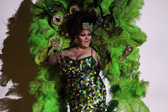 Drag queen Danyel Vasquez opens the show by lip-synching during Sex Weeks Drag Show in the Cartwright Hall Auditorium on Thursday, Oct. 30, 2014.