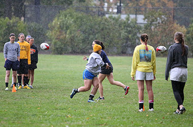 The Kent State Womens Rugby Club Team practice in the rain in front of Taylor hall on September 7, 2014.